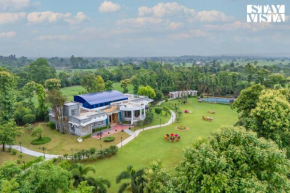 StayVista at Wandering Vines with Pool, WiFi, BBQ